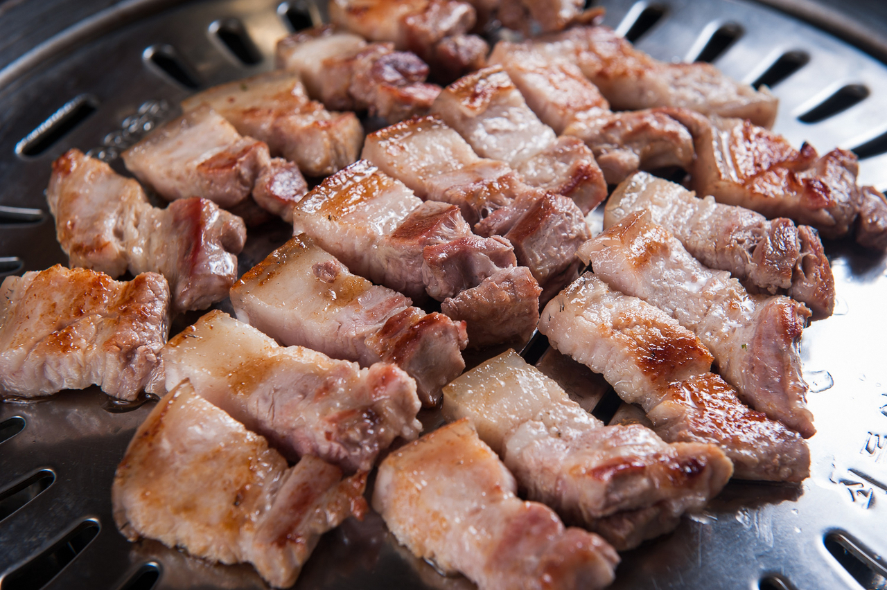 Pork belly barbecue, or samgyeopsal, is a beloved treat among South Koreans. (123rf)