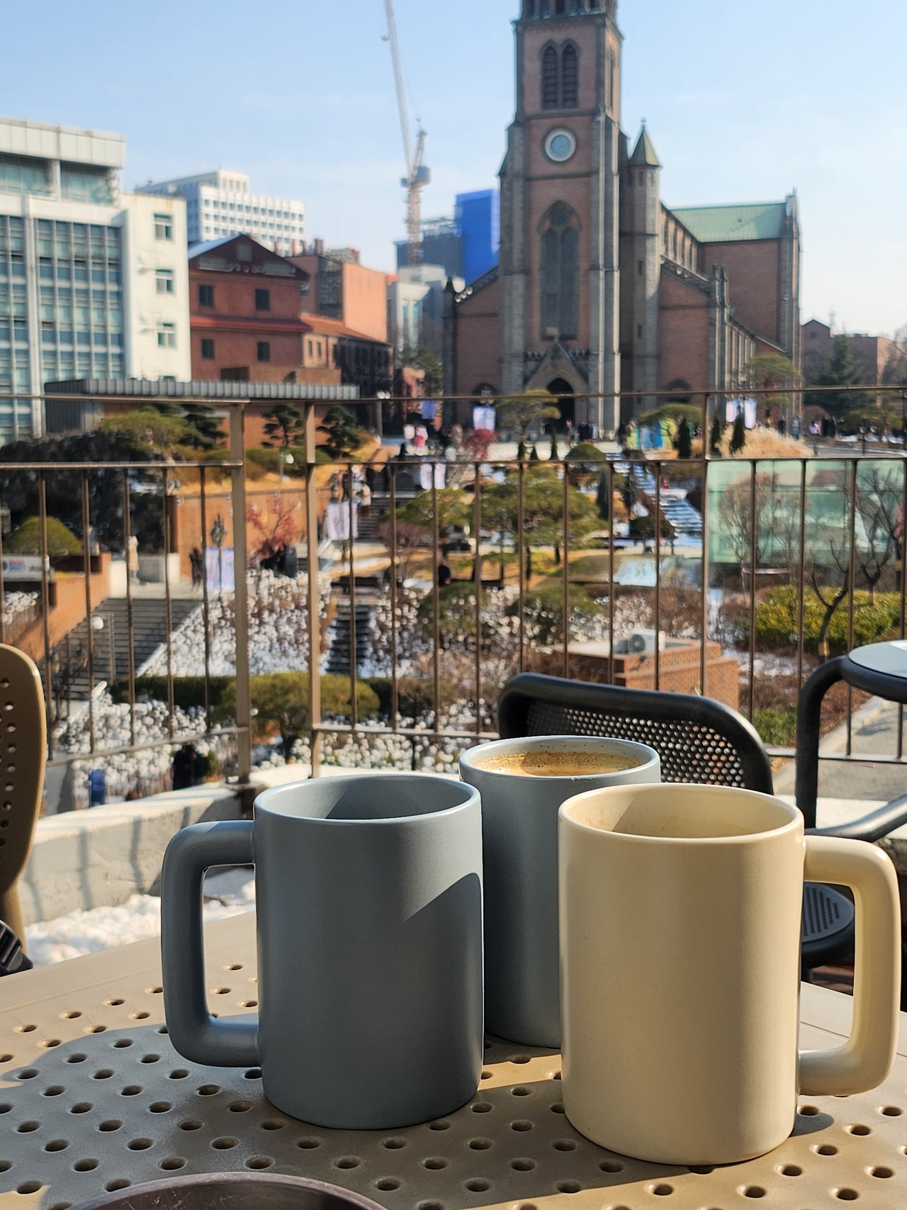 Myeongdong Cathedral is seen from the terrace of cafe Pines (Lee Jung-youn/The Korea Herald)