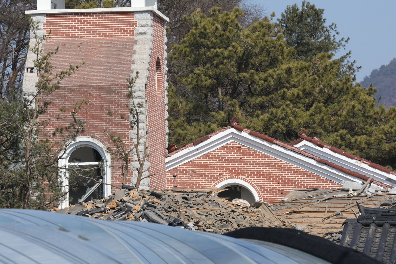 A damaged church building and debris are seen in Pocheon, Gyeonggi Province, after a South Korean Air Force KF-16 accidentally dropped multiple MK-82 bombs during a military exercise on Thursday. (Yonhap)