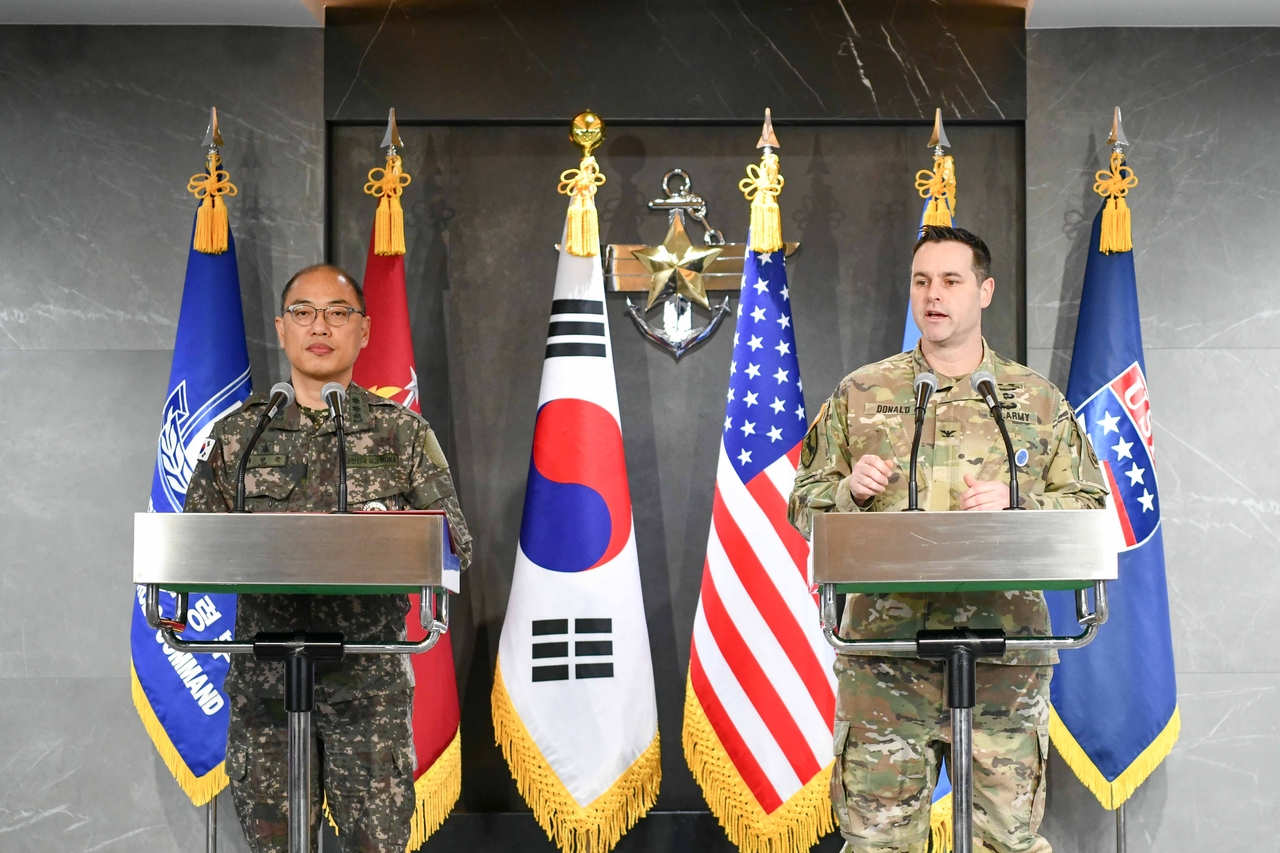 Col. Ryan Donald (right), spokesperson for US Forces Korea, alongside Col. Lee Seong-jun, spokesperson for South Korea's Joint Chiefs of Staff, speaks at a press conference on Thursday in Yongsan-gu, Seoul, ahead of the 2025 Freedom Shield exercise, scheduled to take place from Monday to March 21. (South Korea's Joint Chiefs of Staff)