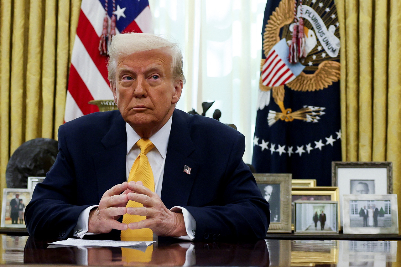 US President Donald Trump sits in the Oval Office of the White House in Washington DC on Friday. (Reuters-Yonhap)