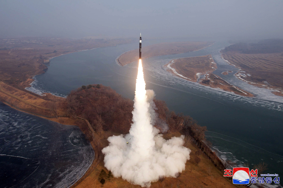 This photo, released by the Korean Central News Agency on Jan. 6, shows the test launch of a hypersonic intermediate-range ballistic missile, as North Korea claimed a successful trial. (Yonhap)