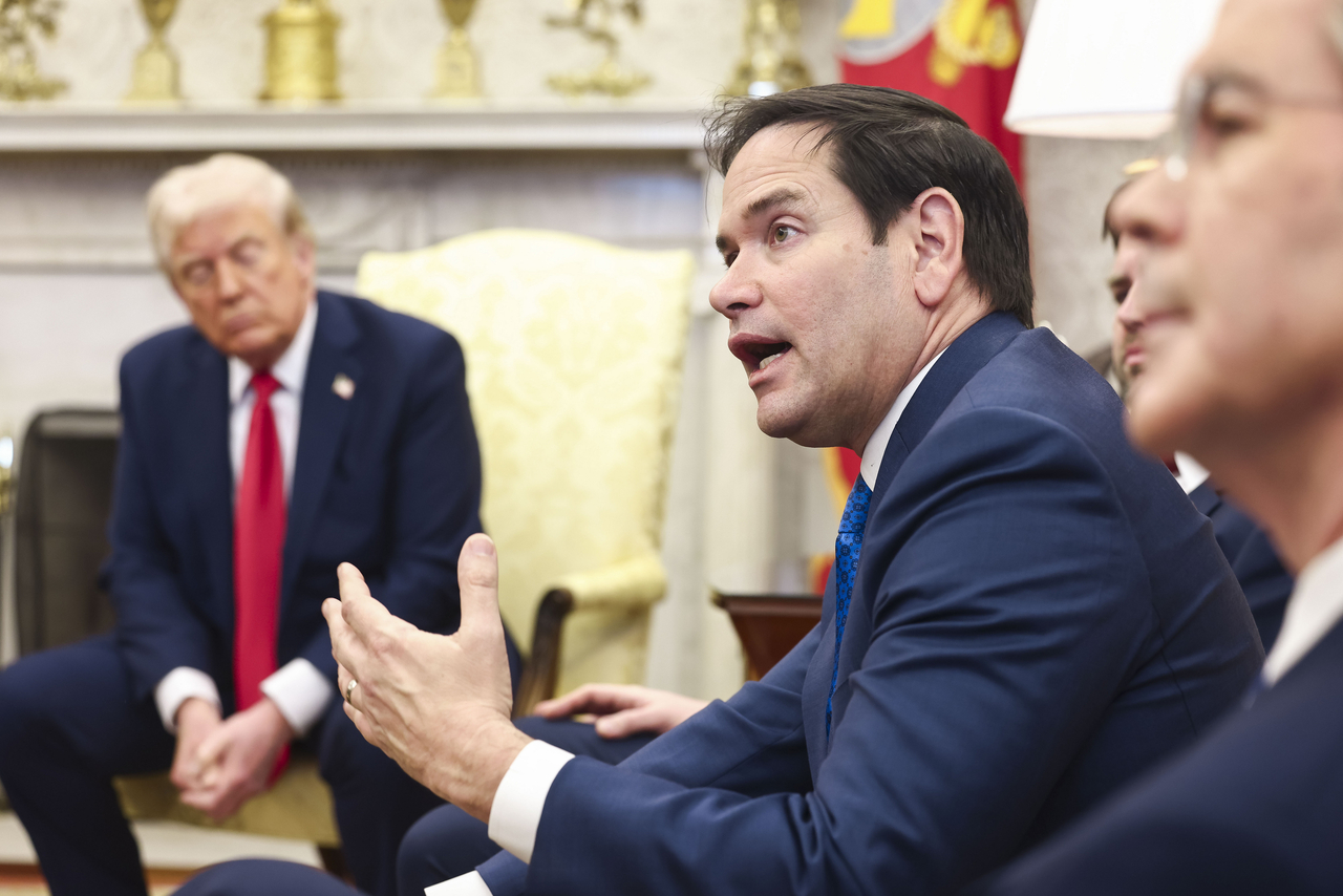 US Secretary of State Marco Rubio speaks while attending a meeting between US President Donald Trump (left) and Ukrainian President Volodymyr Zelenskyy in the Oval Office at the White House in Washington on Friday. (UPI)