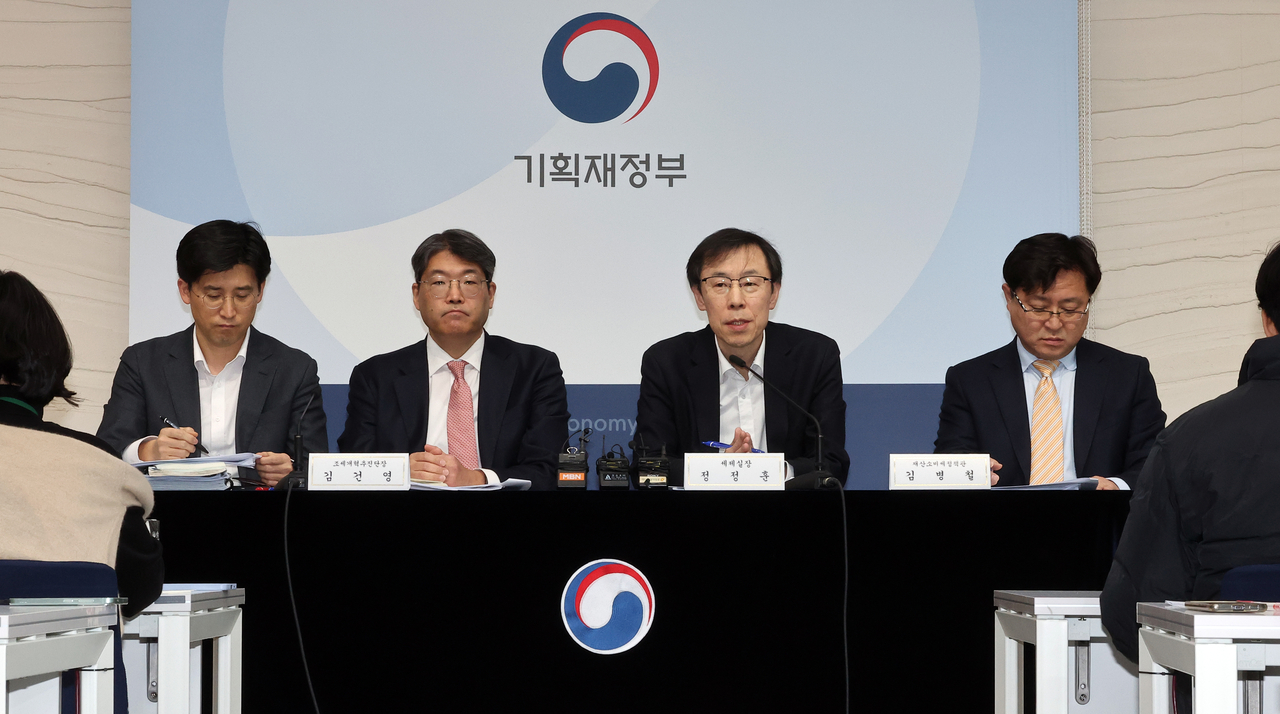 Jeong Jeong-hoon (second from right), head of the tax policy division at the Ministry of Economy and Finance, speaks during a press briefing held in Seoul on Tuesday. (Yonhap)
